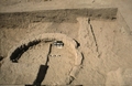 Round structure paved with mud bricks